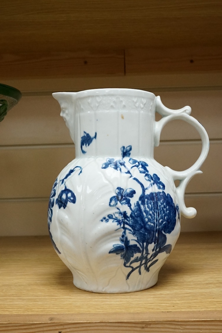 A Caughley blue and white transfer printed mask jug, c. 1780, 21cm high
